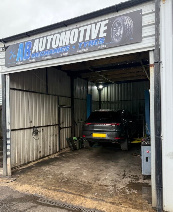 Mechanic working on a car